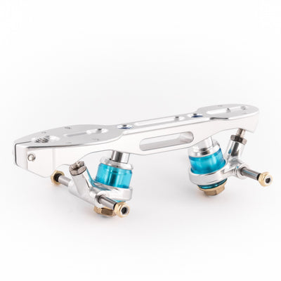 Roll-Line Mistral plate, all silver with gold hardware accents and blue elastomer cushions.