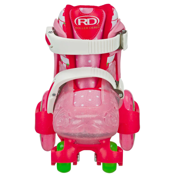 RDS Strawberry Fun Roller adjustable kids skate front view: white straps, pink strawberry print lining and pink and green wheels.
