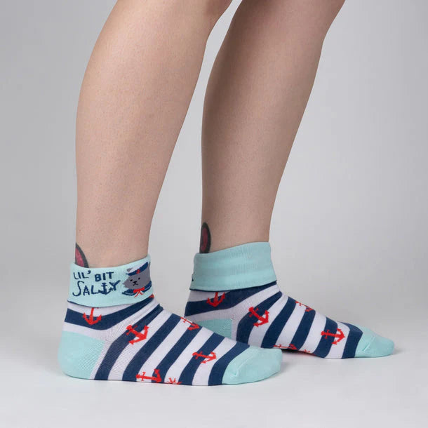 Turn cuff sock in blue and white stripe with orange anchors and a cartoon sailor cat