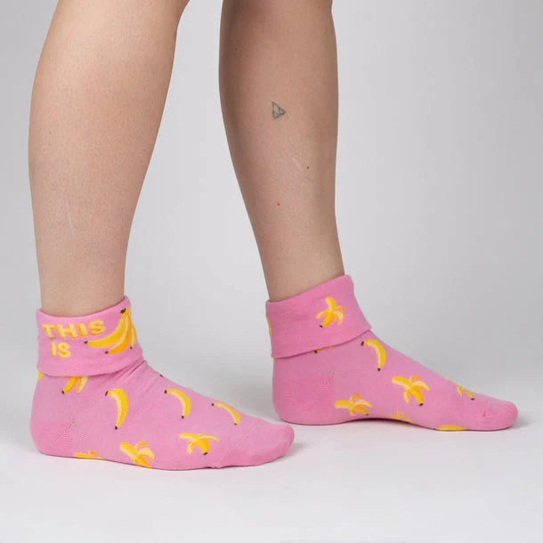 Turn cuff sock in pink with bright yellow bananas