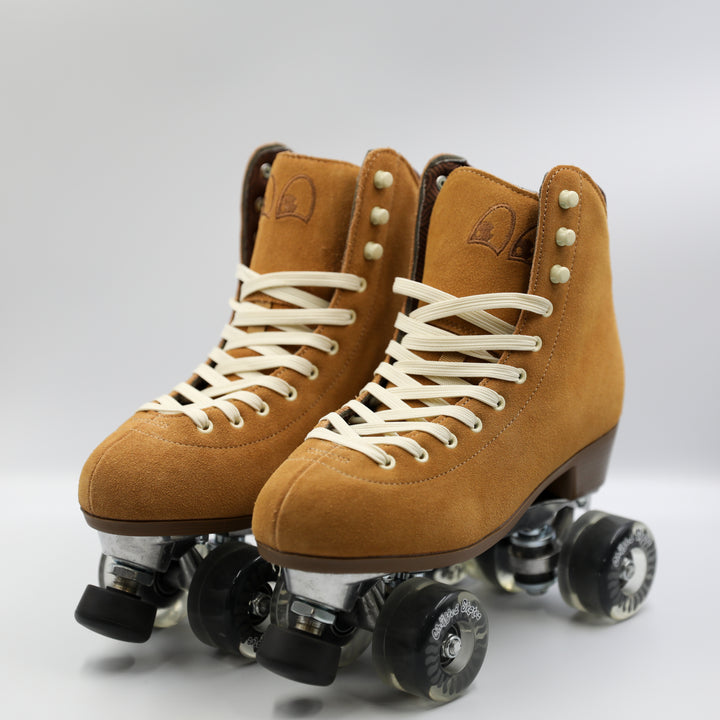 Chuffed Skates Wanderer roller skates in Caramel with white laces on a white background