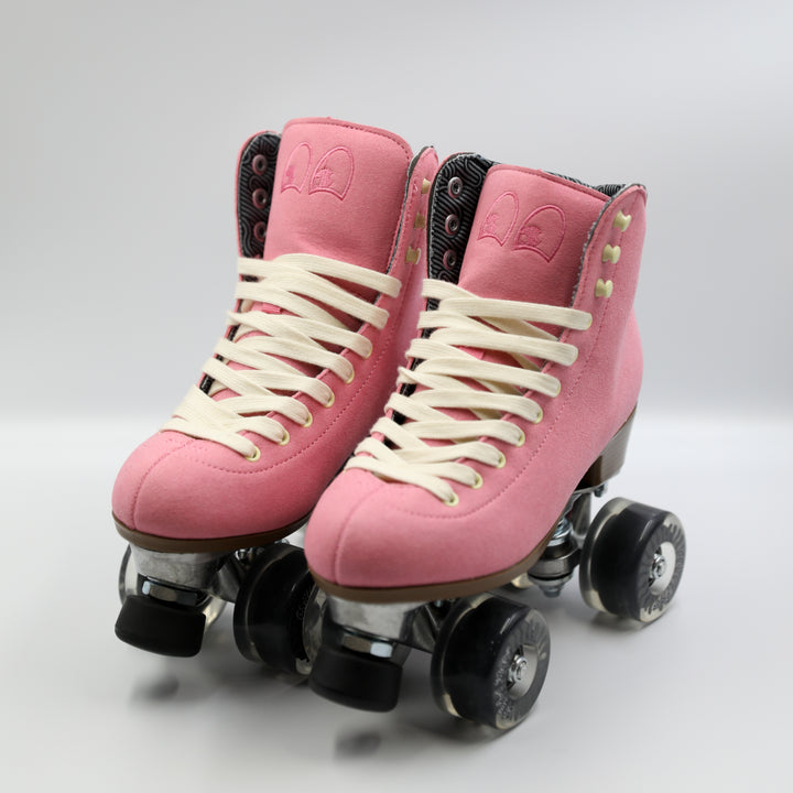 Chuffed Skates Wanderer roller skates in Vegan Pink with white laces on a white background