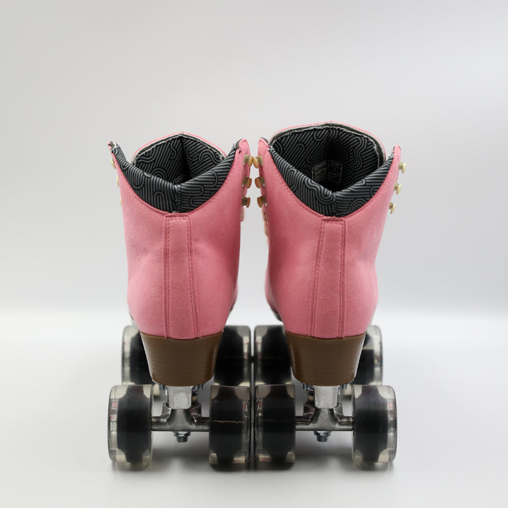 Chuffed Skates Wanderer roller skates in Vegan Pink with white laces on a white background