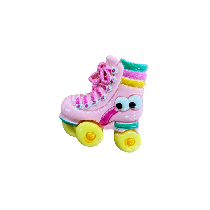 RollerFit How Eye Roll clog charm - pink cartoon style roller skate with eyeballs near the heel and yellow wheels.