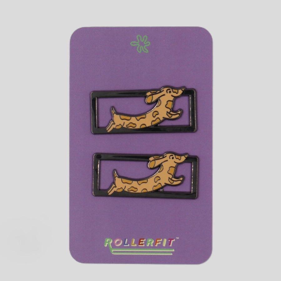Two dachshund lace locks on a purple card with 'ROLLERFIT' branding.