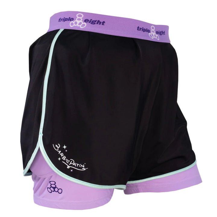 Triple 8 Barbie Patin Bum Saver crash shorts - black athletic looking shorts with purple protection tights underneath