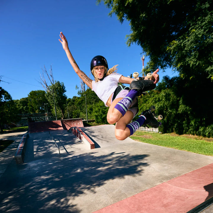 Barbie Patin in a skate park wearing the Triple 8 Barbie Patin Bum Saver crash shorts