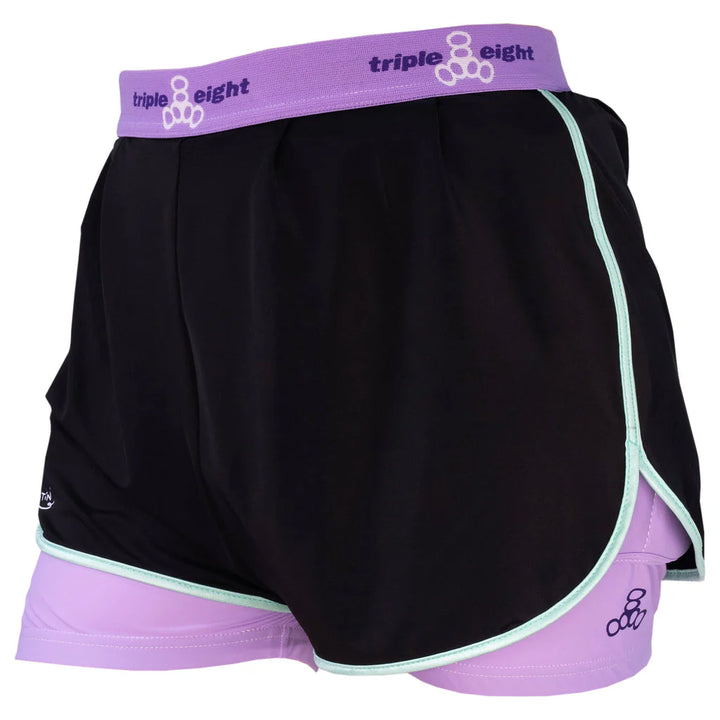 Triple 8 Barbie Patin Bum Saver crash shorts - black athletic looking shorts with purple protection tights underneath