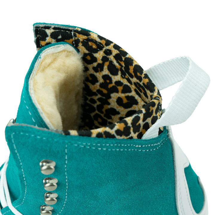 Moxi Roller Skates Jack 1 boots in Jade with tan sole, white backstay and laces, leopard print lining.