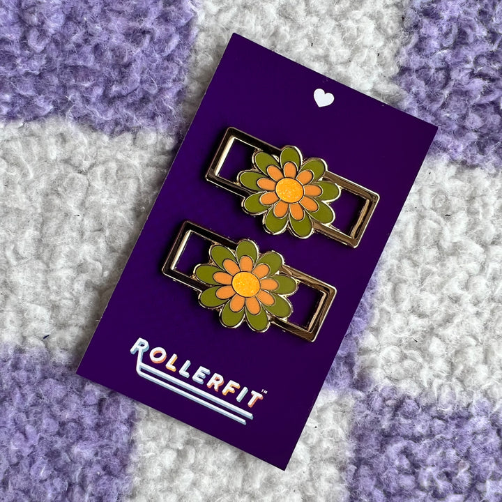 RollerFit Retro Flower Lace Locks gold metal outer and olive green and apricot/orange flower with mustard yellow glitter centre.