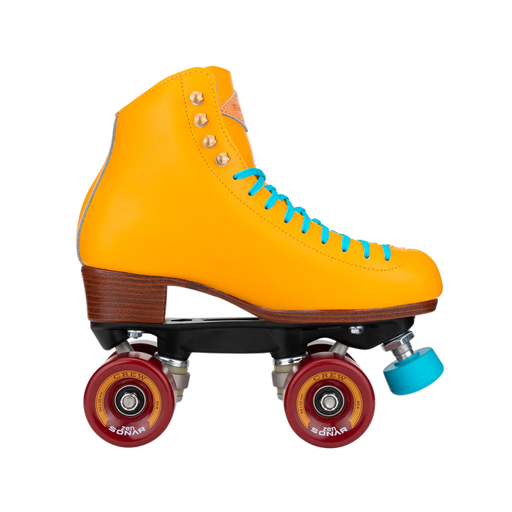 Riedell Crew roller skate in Turmeric yellow with blue laces and toe stop and crimson red wheels.