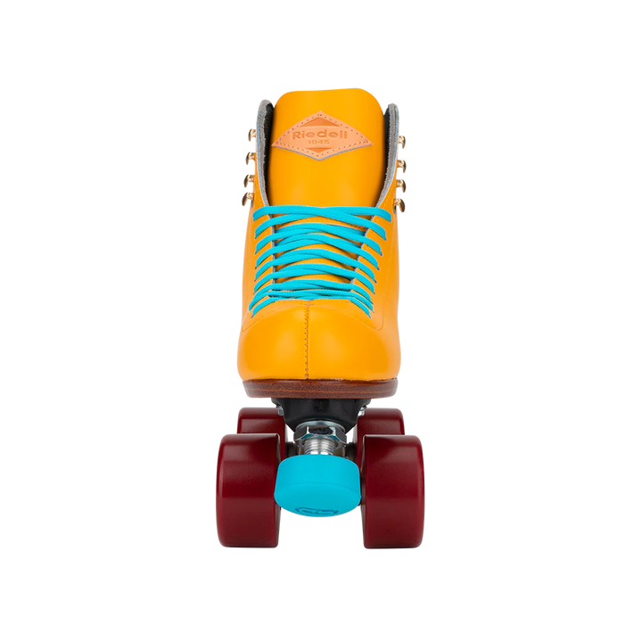 Riedell Crew roller skate in Turmeric yellow with blue laces and toe stop and crimson red wheels.