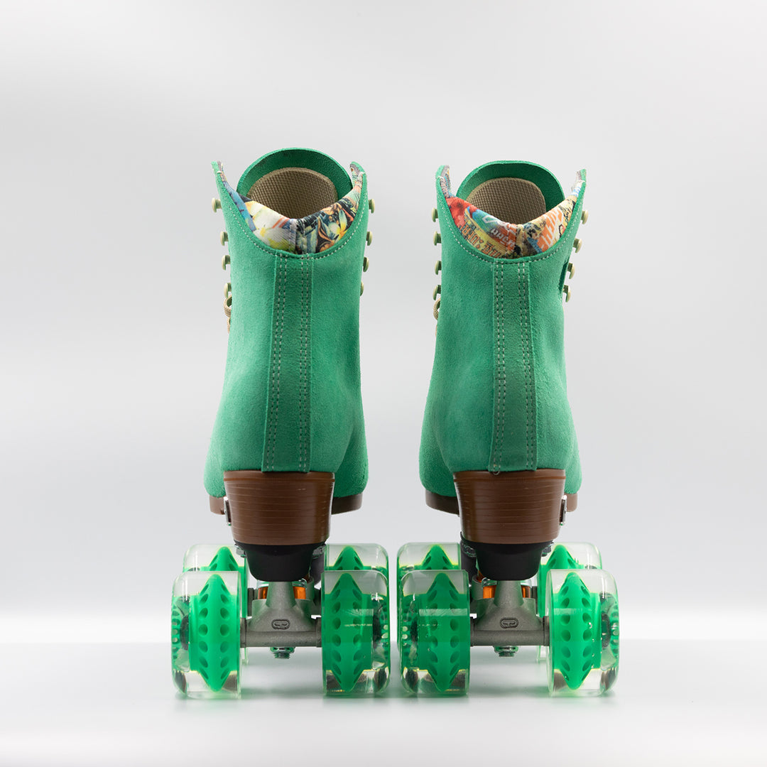 Moxi Roller Skates Lolly roller skate in Green Apple with oyster laces, black plate and toe stops, and matching green wheels.