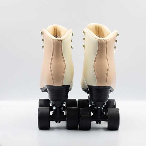 Chuffed Skates Cruiser roller skates in Sunrise, a cream and apricot 2 tone boots with all black hardware.