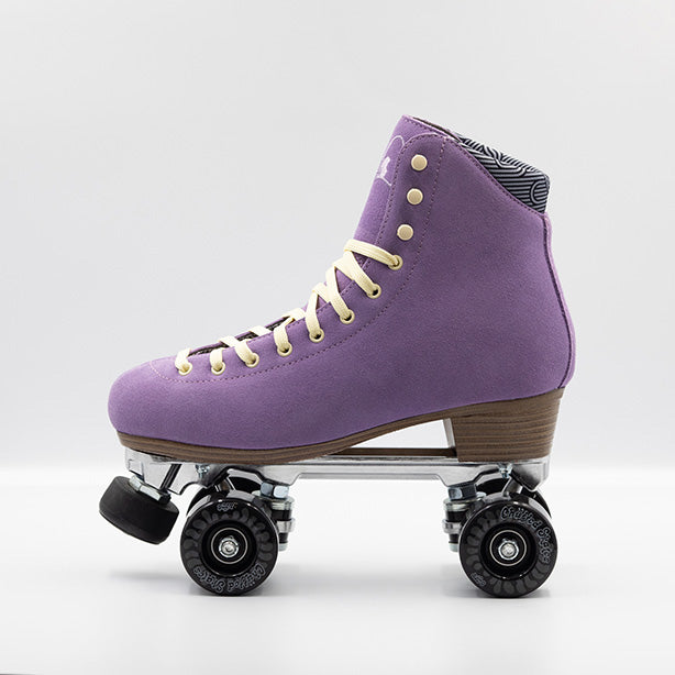 Chuffed Skates Wanderer roller skates in Jacaranda Purple with cream laces, eyelets and logo embroidery on the tongue, black wheels and toe stops.