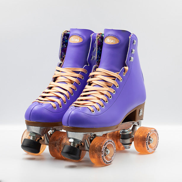 Moxi Roller Skates Beach Bunny skates in Periwinkle with peach laces and wheels.