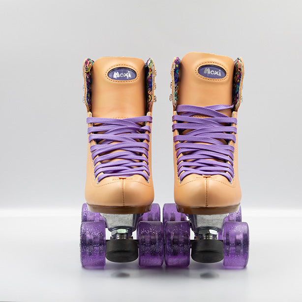 Moxi Roller Skates Beach Bunny skates in Peach with lilac laces and wheels.
