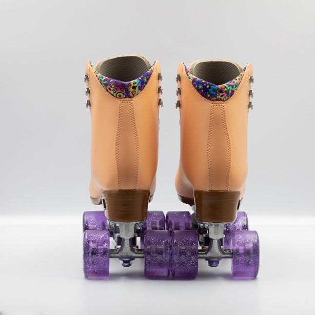 Moxi Roller Skates Beach Bunny skates in Peach with lilac laces and wheels.