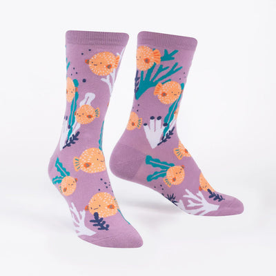 Lilac socks with cute cartoon orange pufferfish and white, teal and navy coral.