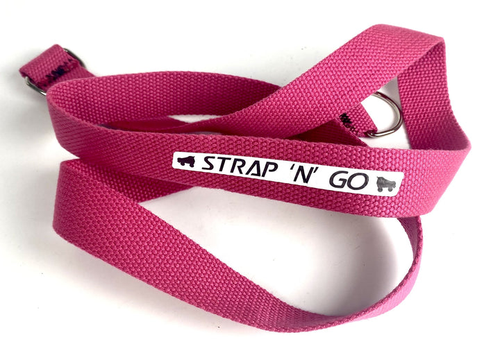 Strap N Go roller skate leash in fuchsia.