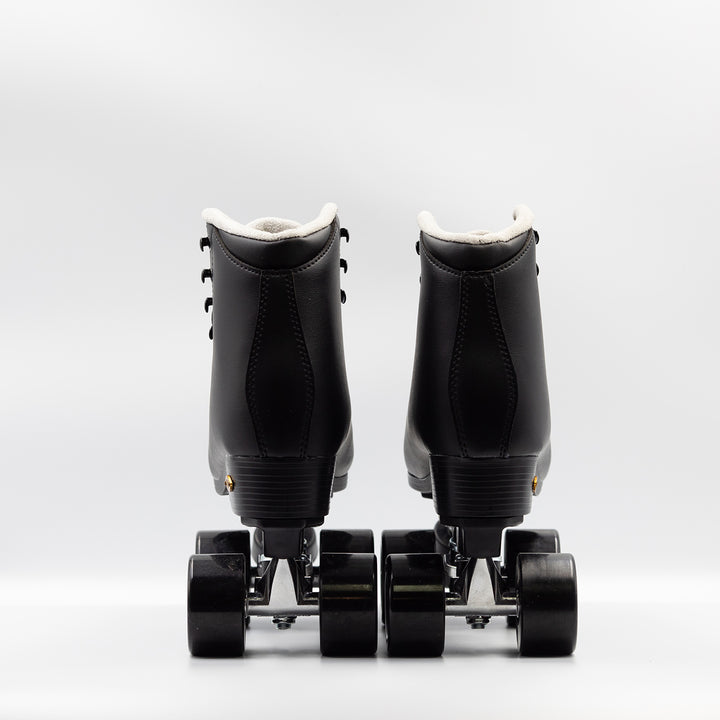 Back view: Sure-Grip Fame roller skates in black.