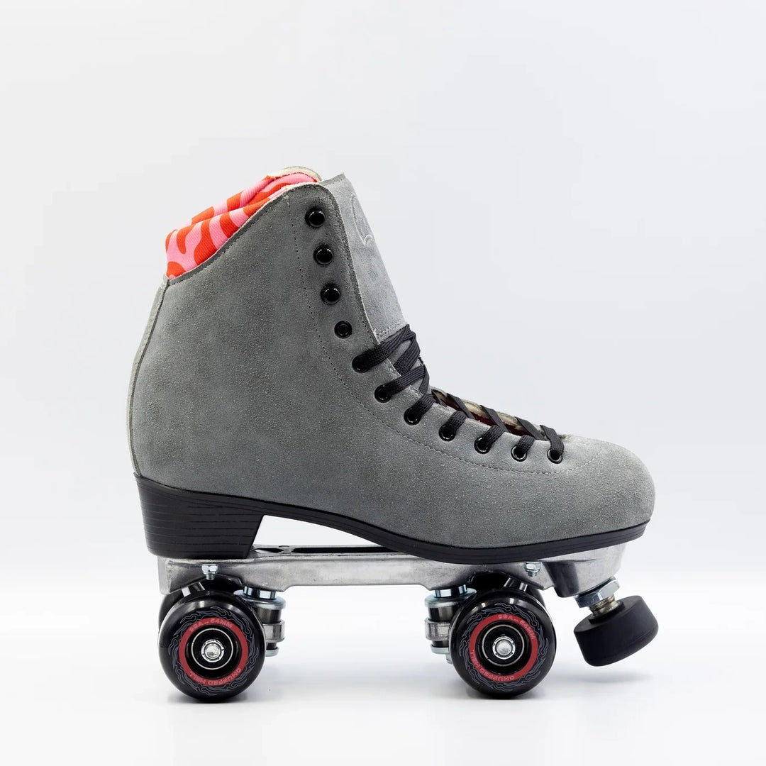 Chuffed Skates Wanderer Plus in Concrete grey with pink and red swirl lining, black wheels and toe stop.