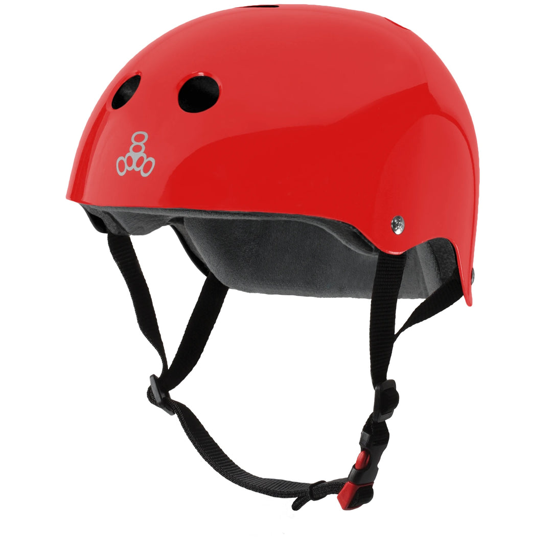 A red gloss triple 8 sweat saver helmet.