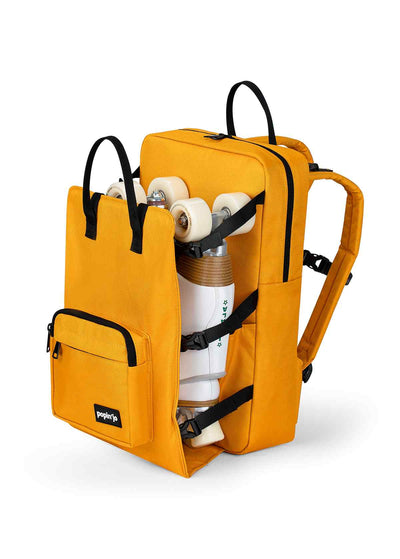 Popin'jo Big'jo Skate Bag backpack in mustard yellow with white roller skates