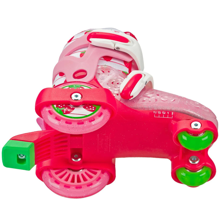 RDS Strawberry Fun Roller adjustable kids skate bottom view: white straps, pink strawberry print lining and pink and green wheels.