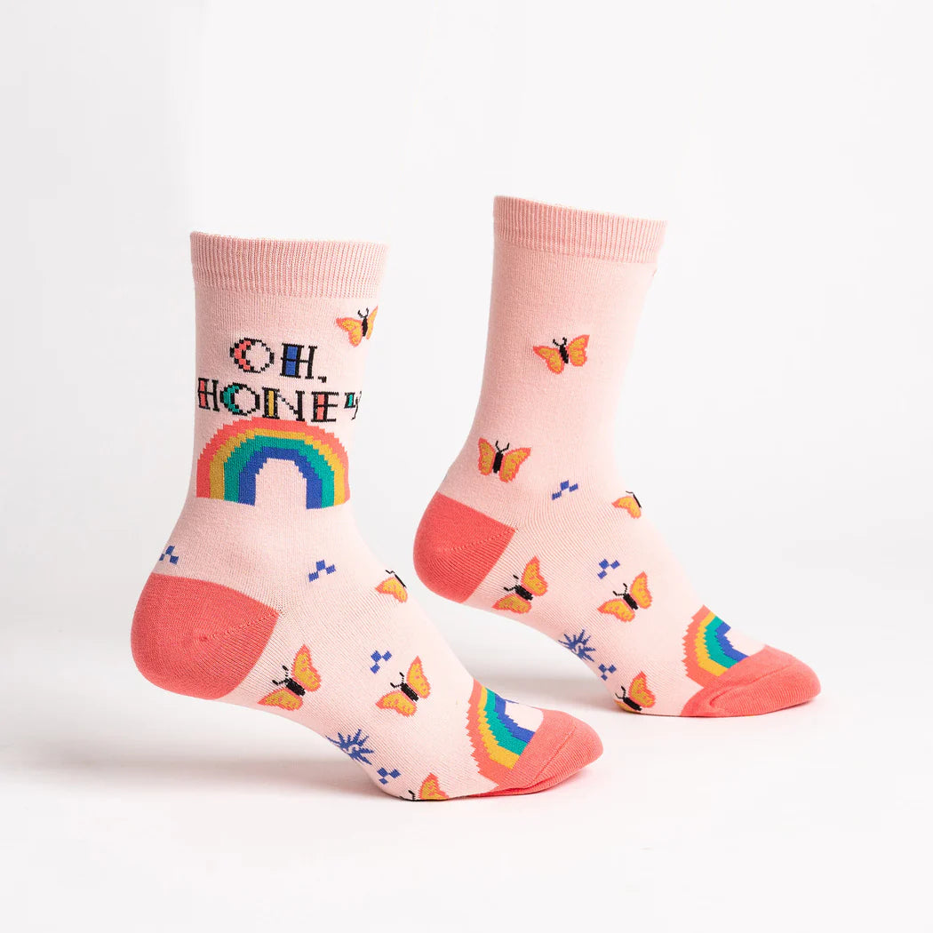 sock it to me socks in pastel pink with butterflies, rainbows and text "oh honey"