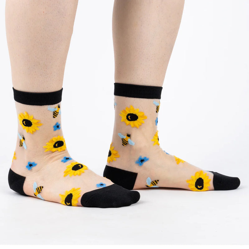 Sock it to Me Womens crew socks - Sunshine - sheer socks with black heel, toe and top band, print of sunflowers, bees and blue flowers