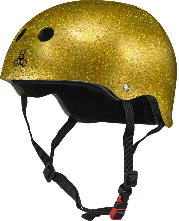 A gold glitter helmet by Triple 8.