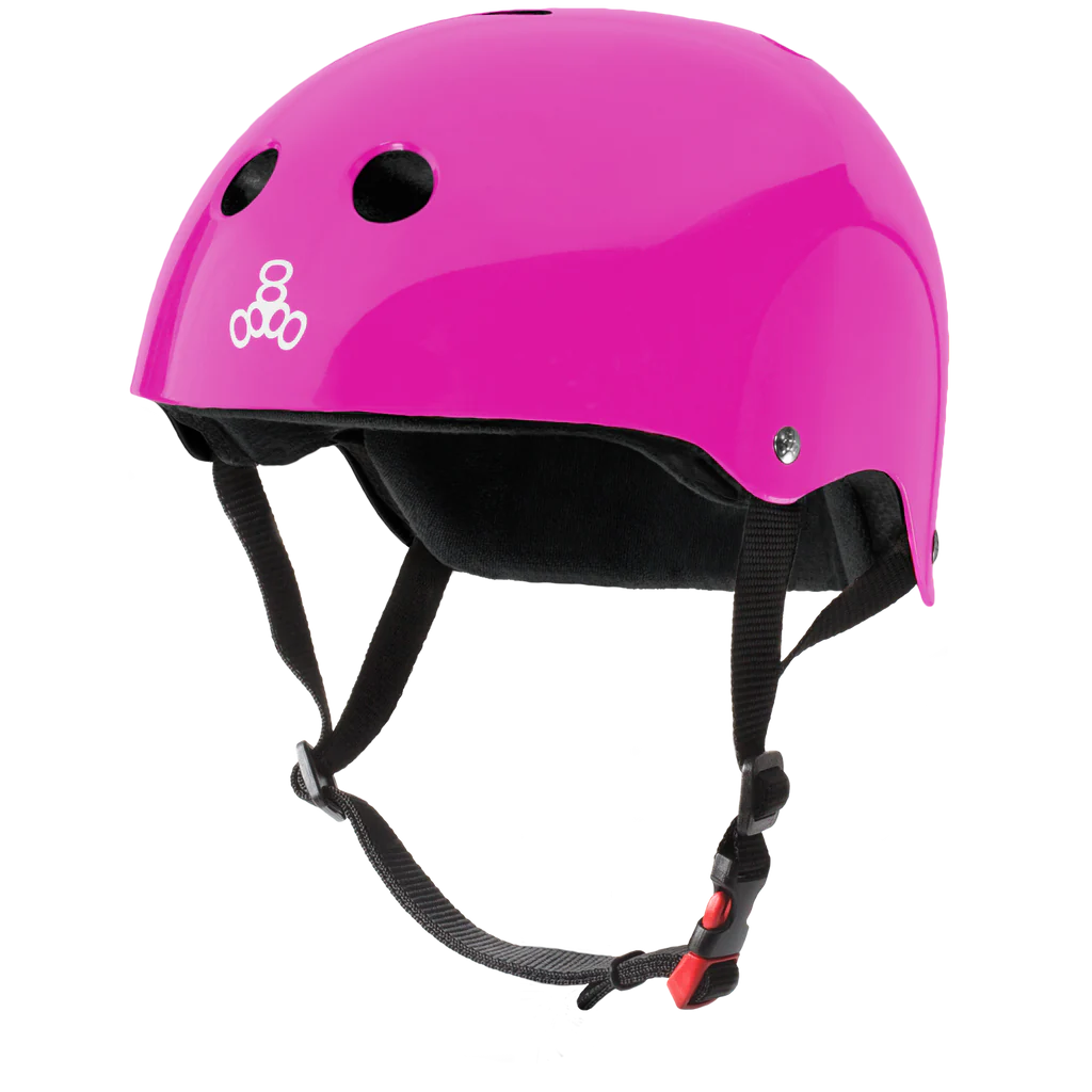 A hot pink gloss helmet by Triple 8.