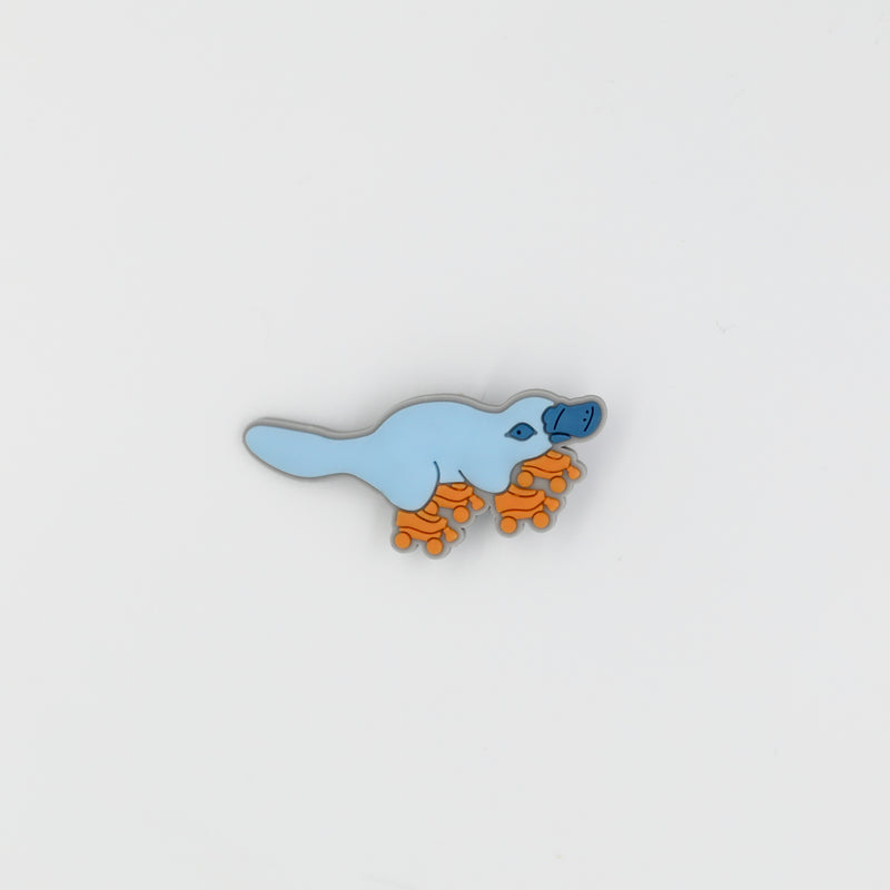 Croc charms designed for roller skaters. This design is the roller skating platypus.
