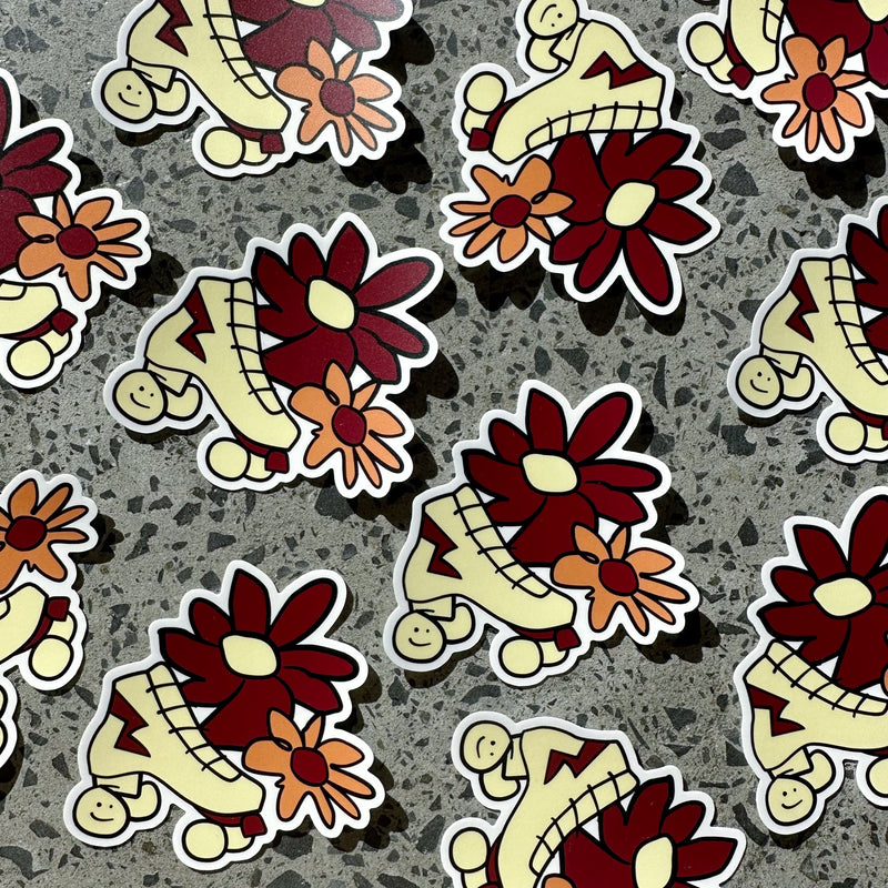 RollerFit Janky roller skate sticker, in a scribble style a cream roller skate with maroon and orange flowers.