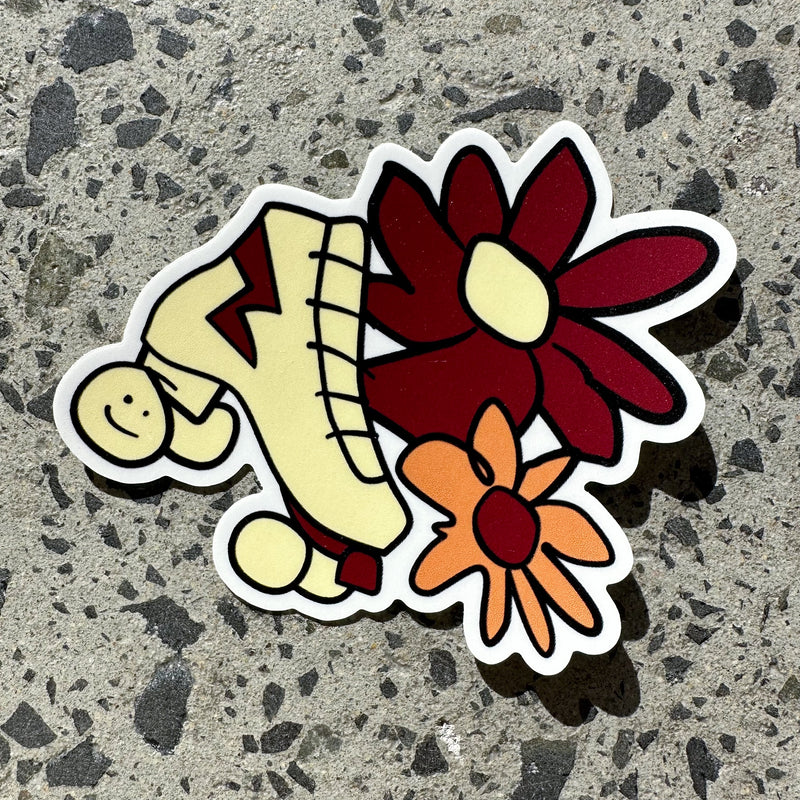 RollerFit Janky roller skate sticker, in a scribble style a cream roller skate with maroon and orange flowers.