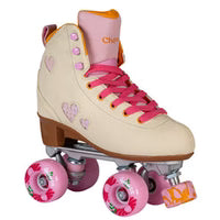 Pink and cream Chaya Cozy Summer Breeze roller skates with heart designs on a white background