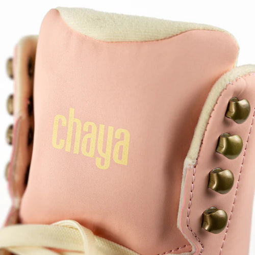 Close up of Dusty Pink Chaya Melrose Elite roller skate with mint green wheels on a white background