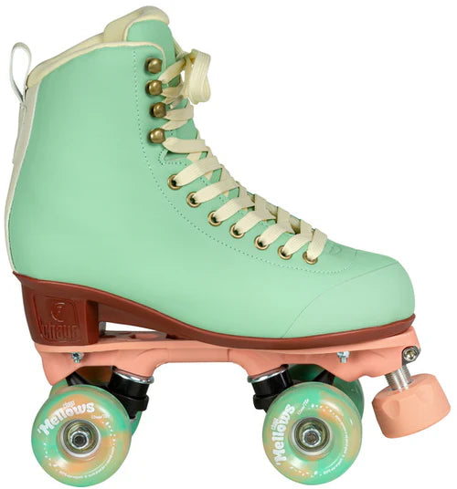 Mint green Chaya Melrose Elite roller skate with mint green wheels and dusty pink plate and toe stop on a white background