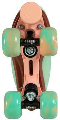 Close up of Mint green Chaya Melrose Elite roller skate with mint green wheels and dusty pink plate and toe stop on a white background