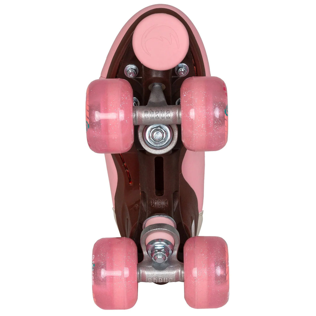 Chaya Miyu Pink Leopard roller skate - pastel pink boot with brown sole, pink wheels and toe stop, cream laces and pink leopard print tongue and lining.