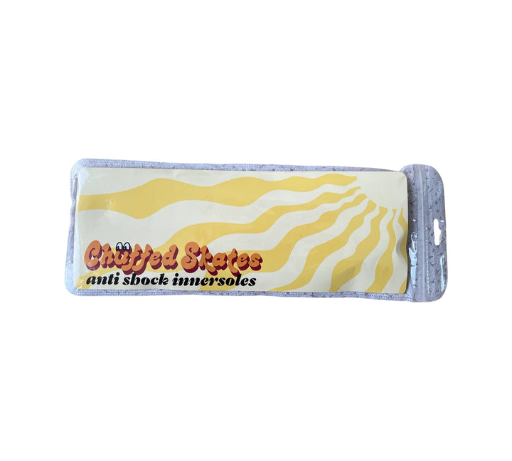 Anti-shock innersoles packaging with wavy design and Chuffed Skates brand name on a white background