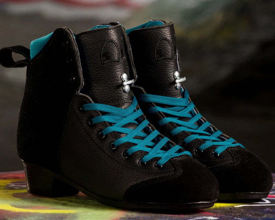 Chuffed Skates Lanna Thornhill Pro roller skate Boots are black textured leather with black suede panels across the toe and ankles. Features a teal blue lining and laces. 