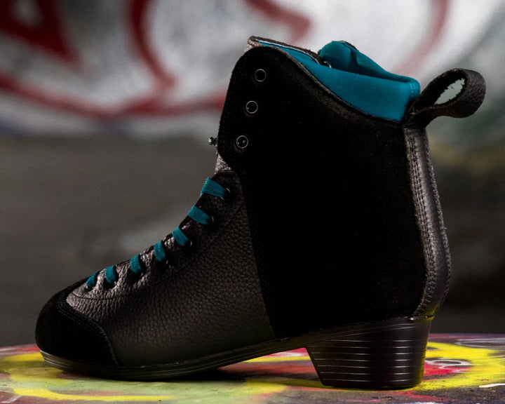 Chuffed Skates Lanna Thornhill Pro roller skate Boots are black textured leather with black suede panels across the toe and ankles. Features a teal blue lining and laces. 