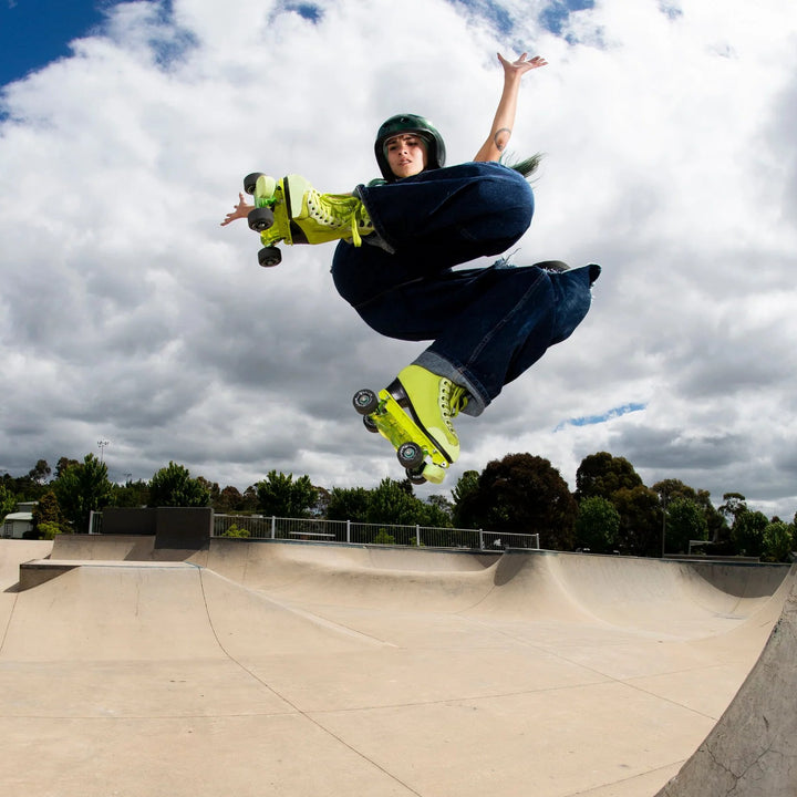 Rib doing a big air at a skatepark wearing her new Rib Pro Boots from Chuffed Skates