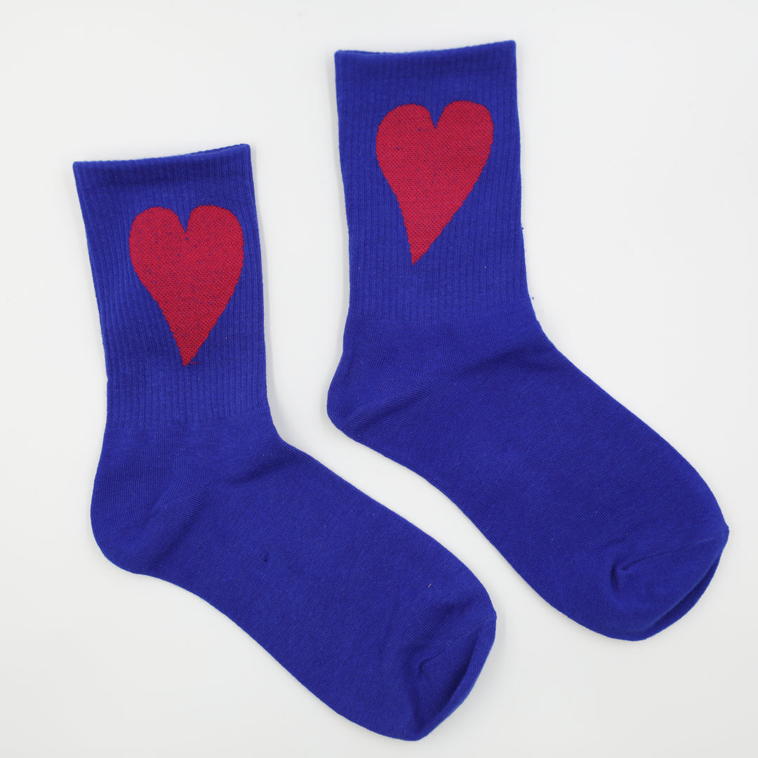 Blue socks with red hearts on a white background