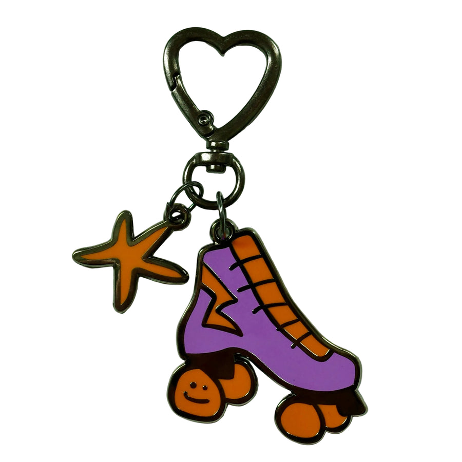 Metal keychain with heart clasp in gunmetal with purple and orange roller skate and orange star ornament