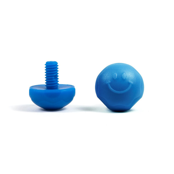 A pair of blue bolt-on toe plugs for roller skates, displayed on a plain background.