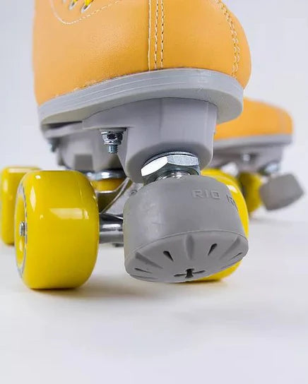 Close up of Yellow Rio Roller Signature roller skate with grey accents on a white background