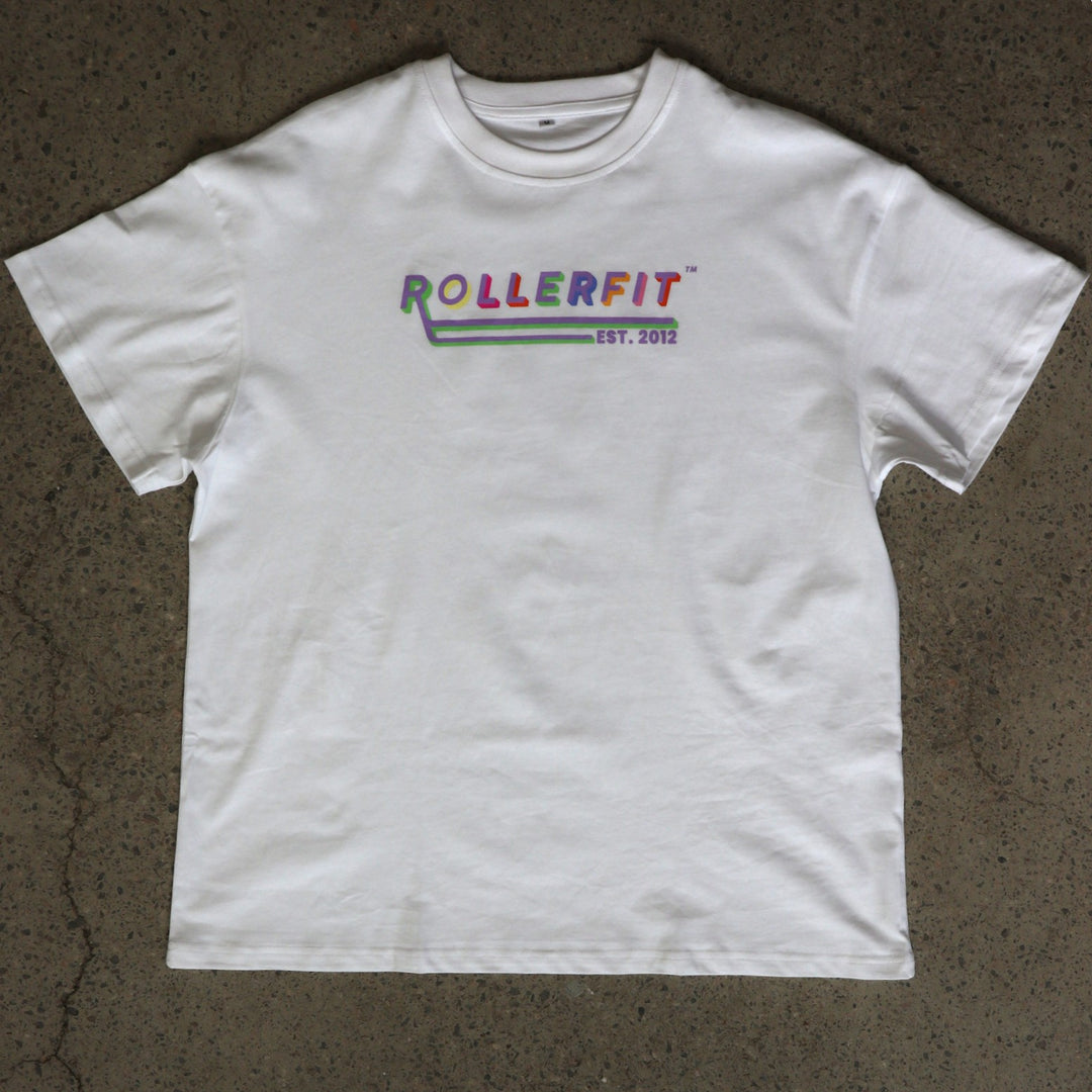 White t-shirt with 'ROLLERFIT' logo on a textured brown surface